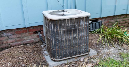 old rusty HVAC air conditioner compressor
