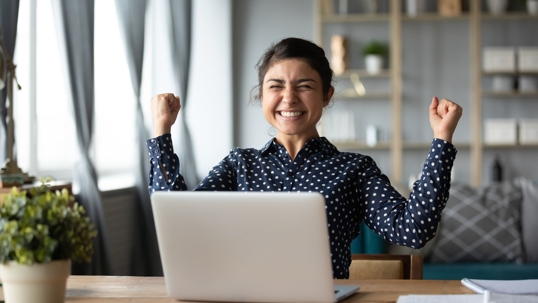 Picture of Happy Woman at Computer